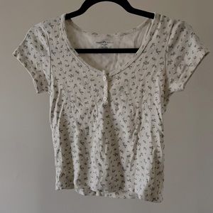 BRANDY MELVILLE- Floral Zelly Top, half button - up
